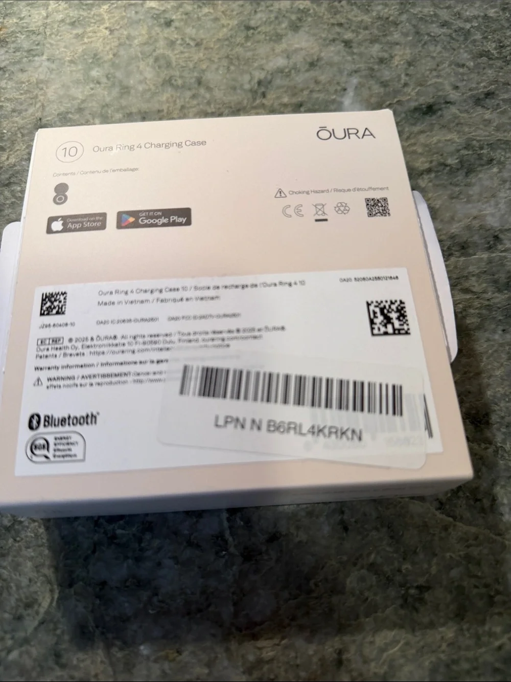Oura Ring 4 portable charging case.